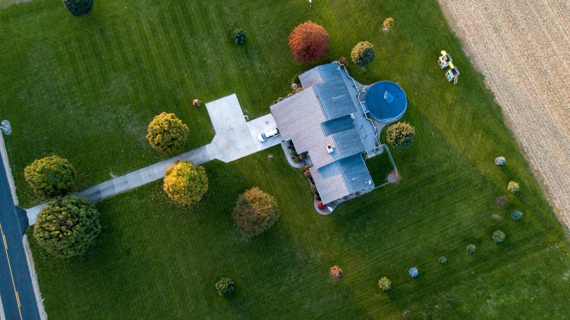 A house with a pool in the middle of it